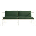 Blu Dot Dog Days Outdoor 2 Seat Sofa in Sunbrella Ivy green cushions with white powder-coated aluminum frame and all-weather rattan