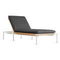 Blu Dot Dog Days Outdoor Sun Lounger in Sunbrella Coal black cushion with white powder-coated aluminum frame and all-weather rattan