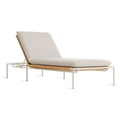 Blu Dot Dog Days Outdoor Sun Lounger in Sunbrella Linen cushion with white powder-coated aluminum frame and all-weather rattan