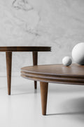 DK3 Groove Coffee Table in smoked oak, close view of the grooved table edge and tapered legs