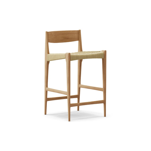 DK3 Pia Counter Stool in Oiled Oak, wooden counter stool with a natural paper cord seat and footrest, angled view on white