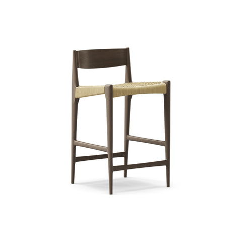 DK3 Pia Counter Stool in Smoked Oak, wooden counter stool with a natural paper cord seat and footrest, angled view on white