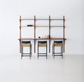 DK3 Pia Counter Stools in black lacquered oak at a wall mounted System Cado desk