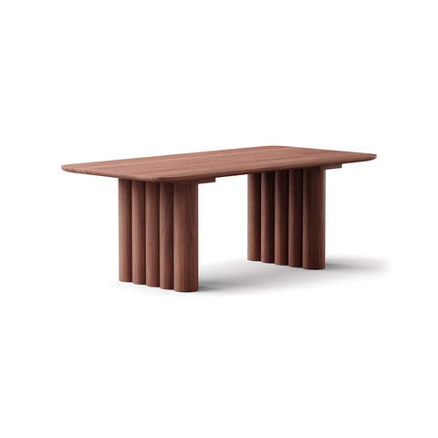 DK3 Plush Table Rectangular in Walnut, solid wood dining table with soft rounded legs, angled view on white