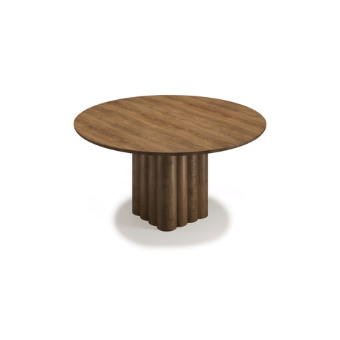 DK3 Plush Table Round in Smoked Oak, round solid wood dining table on a sculpted cube base, angled view on white