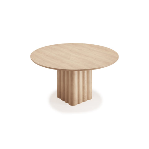 DK3 Plush Table Round in Soaped Oak, round solid wood dining table on a sculpted cube base, angled view on white