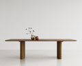 DK3 Plush Table Rectangular in smoked oak, solid wood dining table in a white room
