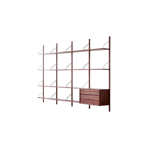 Royal System Shelving 4 Bay with Drawers by Poul Cadovius for DK3 in walnut with brass hangers and a three-drawer cabinet, angled view