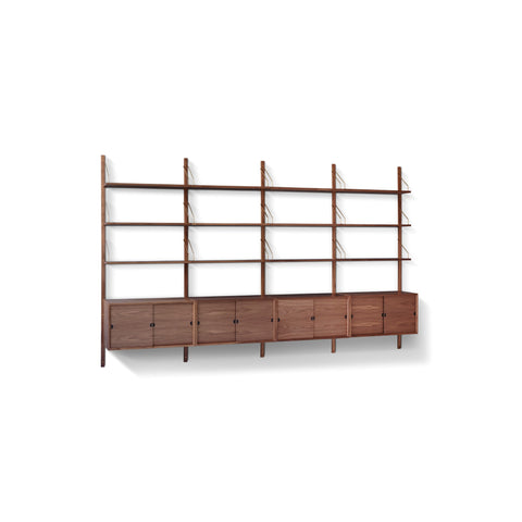 DK3 Royal System Shelving 4 Bay with Sliding-Door Cabinets in Walnut and Brass, walnut wall shelving above four cabinets, angled view on white