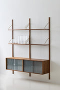 DK3 Royal System walnut cabinet with two sliding rippled glass doors below walnut shelves