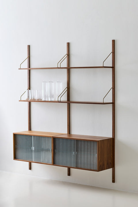 DK3 Royal System walnut cabinet with two sliding rippled glass doors below walnut shelves