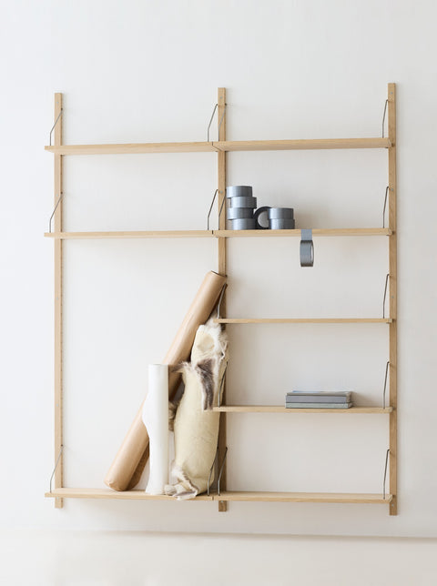 DK3 Royal System wall shelving in soaped oak with stainless steel hangers
