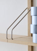 DK3 Royal System soaped oak shelf on stainless steel hangers, close view