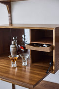 DK3 System Cado smoked oak drop-front cabinet, close view of the mirror, shelf and tray inside
