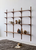 DK3 System Cado smoked oak rails with shelves styled with ceramics