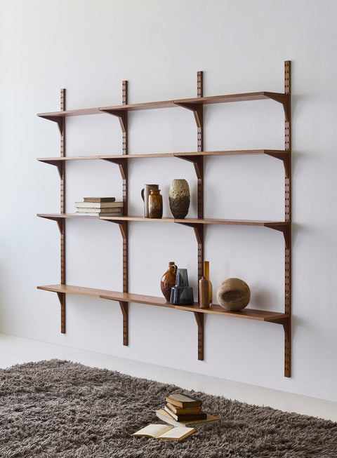 DK3 System Cado smoked oak rails with shelves styled with ceramics