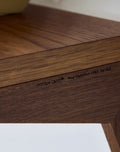 DK3 System Cado shelf in smoked oak, close view of the wood grain and edge