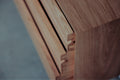 DK3 System Cado Sideboard, close view of the corner joint and sliding front