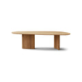 DK3 Tangent Table Rectangular in Oiled Oak, solid wood dining table with an asymmetrical top and sculptural base, side view on white