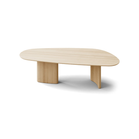 DK3 Tangent Table Rectangular in Soaped Oak, solid wood dining table with an asymmetrical top and sculptural base, angled view on white