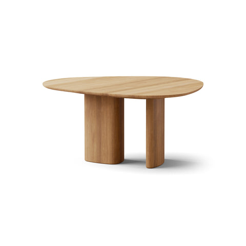 DK3 Tangent Table Round in Oiled Oak, extendable solid wood dining table with an asymmetrical top, side view on white