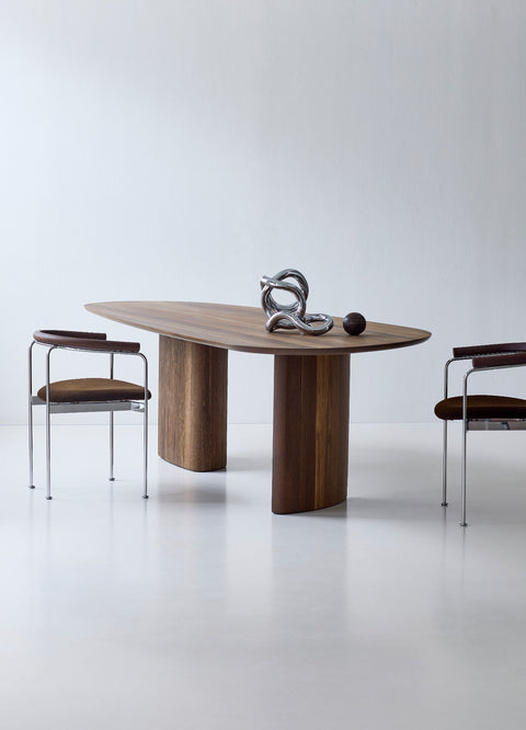 DK3 Tangent Table Rectangular in smoked oak with chrome framed chairs in a white room