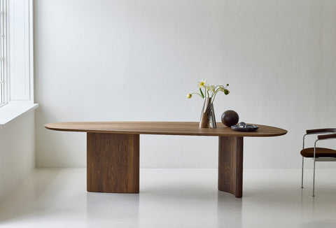 DK3 Tangent Table Rectangular in smoked oak in a white room