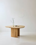 DK3 Tangent Table Round in oiled oak, curved top on a solid wood base