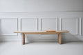 DK3 Ten Bench in soaped oak against a white panelled wall