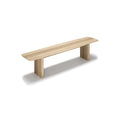 DK3 Ten Bench in White Oiled Oak, solid wood dining bench with grooved legs and a curved top, angled view on white