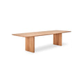 DK3 Ten Table Rectangular in Oiled Wild Oak, solid wood dining table with grooved legs and a curved top, angled view on white