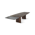 DK3 Ten Table Rectangular in Smoked Oak, solid wood dining table extended with a black MDF leaf at one end, angled view on white