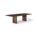 DK3 Ten Table Rectangular in Smoked Oak, solid wood dining table with grooved legs and a curved top, angled view on white