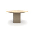 DK3 Ten Table Round in White Oiled Oak, round solid wood dining table on a grooved cube base, front view on white