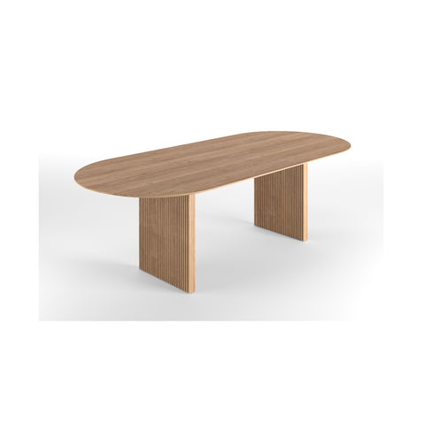 DK3 Ten Table Oval in oiled oak, angled view showing the solid wood top and sculpted legs, on a white background