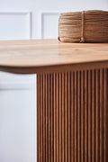 DK3 Ten Table Rectangular in oiled wild oak, close view of the rounded corner above the fluted base