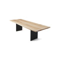 DK3 Tree Table in Oiled Oak, plank dining table with natural edges on black steel legs, angled view on white