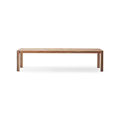 DK3 Jeppe Utzon Table #1 in Oiled Wild Oak, solid wood dining table with a straight edge, side view on white