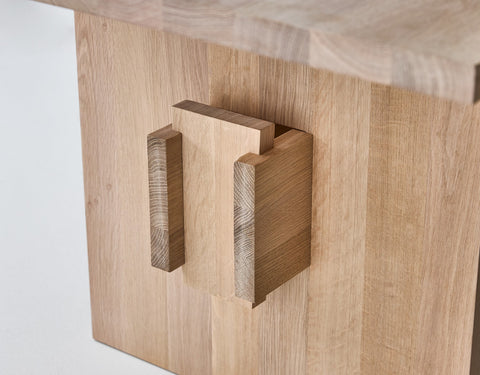 DK3 Jeppe Utzon Table #2 in soaped oak, close view of the wedged joint in the base