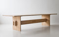 DK3 Jeppe Utzon Table #2 in soaped oak, side view showing the solid plank base
