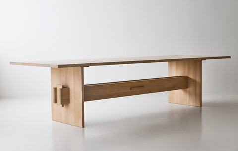 DK3 Jeppe Utzon Table #2 in soaped oak, side view showing the solid plank base