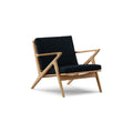 DK3 Z Chair in Alpaca Midnight Blue 1108 and Oiled Oak, fabric lounge chair with a Z-shaped solid wood frame, angled view on white
