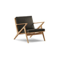 DK3 Z Chair in Rio Leather Black 0500 and Oiled Oak, leather lounge chair with a Z-shaped solid wood frame, angled view on white