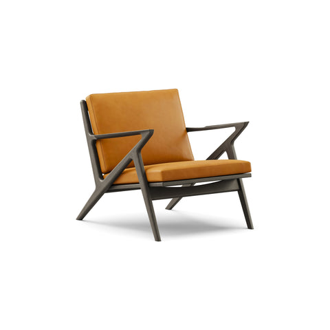 DK3 Z Chair in Rio Leather Cognac 2488 and Black Lacquered Oak, leather lounge chair with a Z-shaped solid wood frame, angled view on white