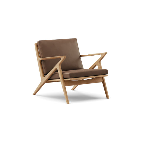 DK3 Z Chair in Rio Leather Mocca 2880 and Oiled Oak, leather lounge chair with a Z-shaped solid wood frame, angled view on white