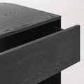 Blu Dot Dally Nightstand in black, close-up detail of painted ash veneer top and open soft-close drawer showing wood grain under the painted finish