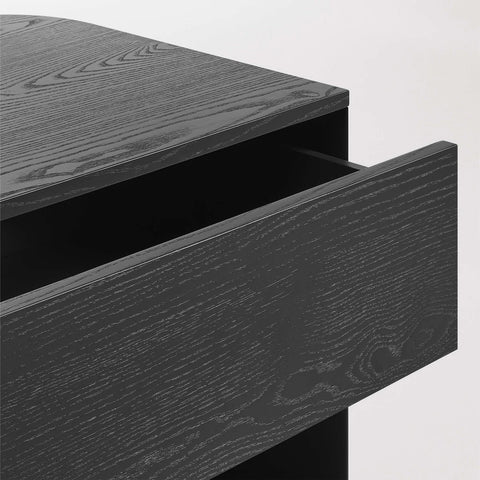Blu Dot Dally Nightstand in black, close-up detail of painted ash veneer top and open soft-close drawer showing wood grain under the painted finish