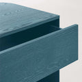 Blu Dot Dally Nightstand in space blue, close-up detail of painted ash veneer top with soft-close drawer pulled open
