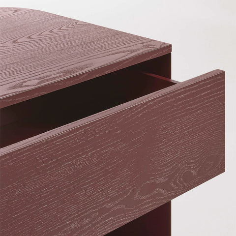 Blu Dot Dally Nightstand in oxblood, close-up detail of painted ash veneer top with soft-close drawer pulled open