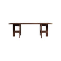 Frama Farmhouse Trestle Table in Dark Oak, long dark oak top resting on two trestles, seen from the side against white